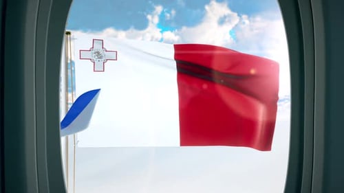 Waving Malta Flag from Airplane Window