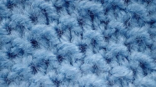Macro Dolly Shot Blue Knit Fabric Texture Extreme Closeup Knitted Clothing Wool Textile Detailed