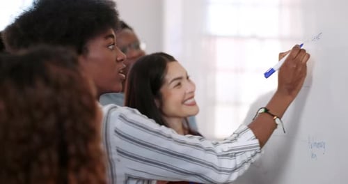 Young Adults Collaborating in a Workplace Brainstorming Session