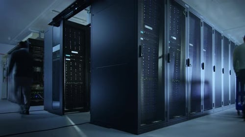 Time Lapse Footage of IT Employees Working in a Data Center Server Room. Technicians and Engineers
