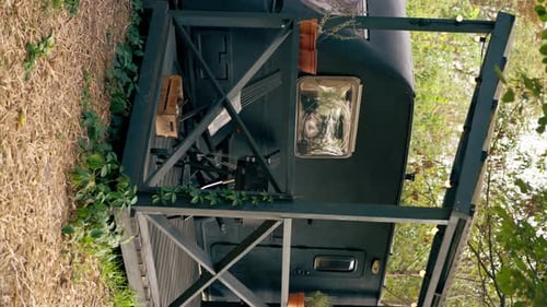 vertical video A mobile home with a terrace is located in country glamping site for relaxation