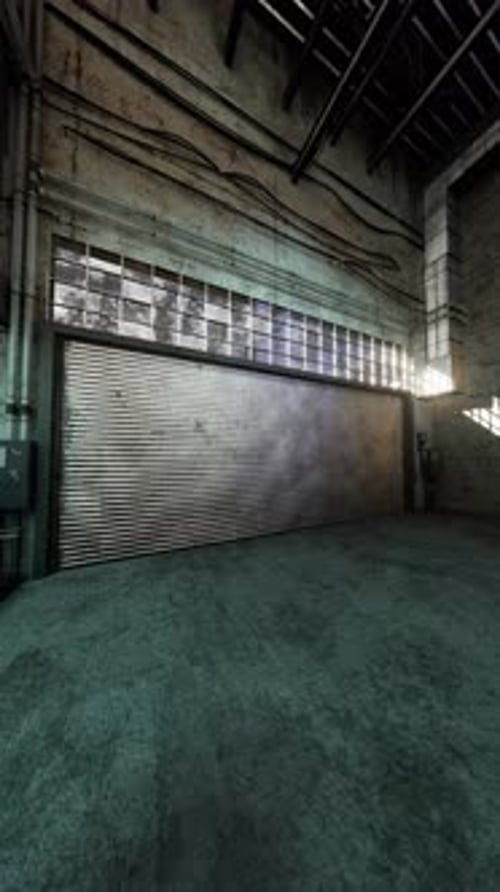 Large Garage With Open Door in Building