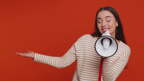 Woman Talking with Megaphone Proclaiming News Loudly Announcing Advertisement Pointing Empty Place