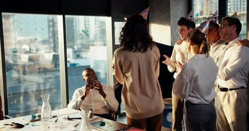 Congratulation Black Male Businessman in a Business Team at Work in the Office Colleagues in Festive