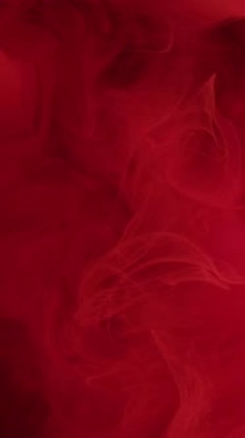 Abstract Red Fluid Swirls in Motion