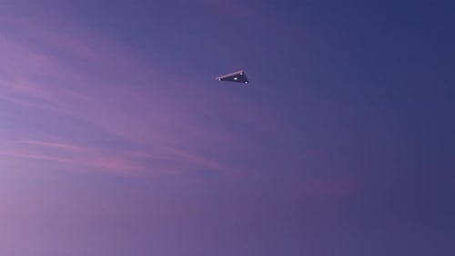 A triangular UFO flies over the ocean. 3d render