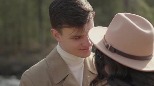Young Couple on Walk in Park in the Spring