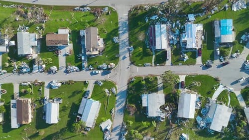 Severely Damaged Houses After Hurricane Ian in Florida Mobile Home Residential Area Consequences of