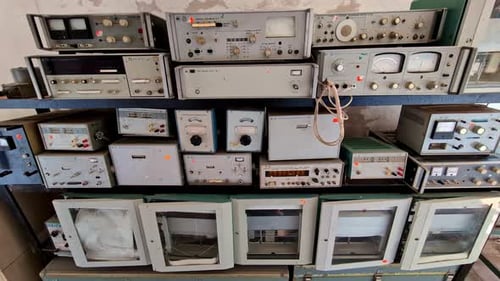 Shelves of Vintage Radio and Electrical Test Equipment
