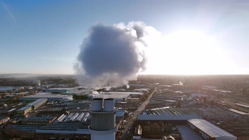 Aerial View of Industrial Smokestack Emission