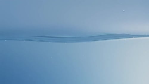 Abstract Blue Water Surface with Gentle Ripples
