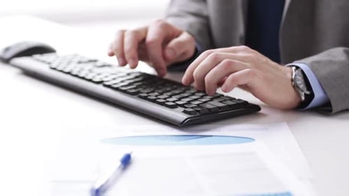 People, Business, Technology and Office Work Concept - Close Up of Businessman