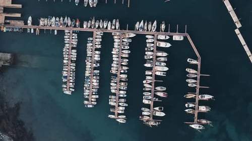 Boats And Yachts Moored In Marina Bay