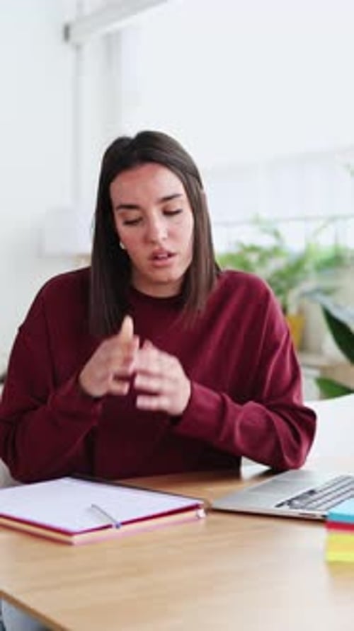 Young Woman Feeling Stressed While Working From Home