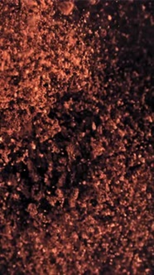 Ground Coffee Flies Up and Falls Down Filmed on a Highspeed Camera at 1000 Fps