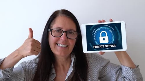 Private server access. Woman holding up a tablet with encrypted login. Good security concept.
