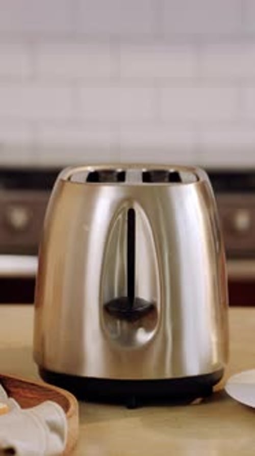 Slices of Bread popping up From Toaster