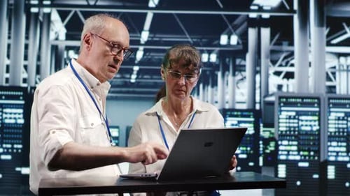 Employees Crosschecking Server Parts