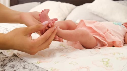 Gentle Massage of Baby's Feet at Home