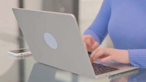 Close up of Female Hands Typing on Laptop