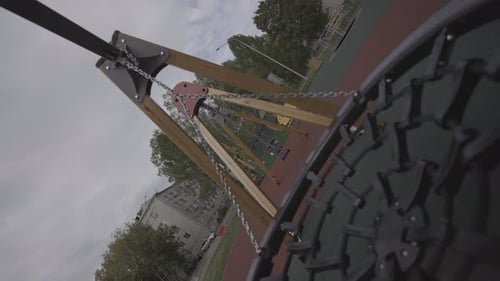 Swing on Playground Provides Space for Kids to Have Fun