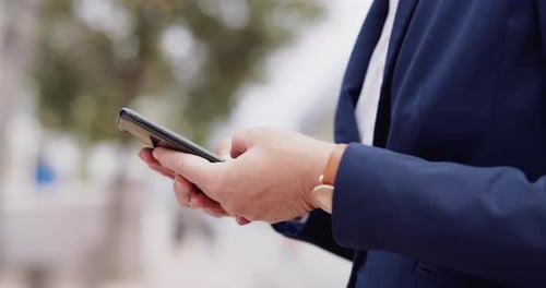 Businessperson, phone and hands typing in the city with web networking and communication