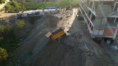 A Large Truck Transports Ore at an Industrial Plant