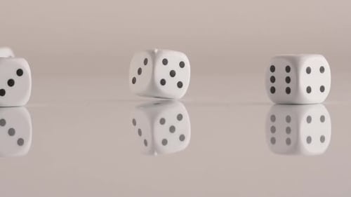 Rolling White Dice on Reflective Surface