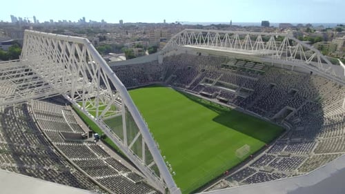 Close-up parallax shoot of empty grass inside bloomfield stadium #007