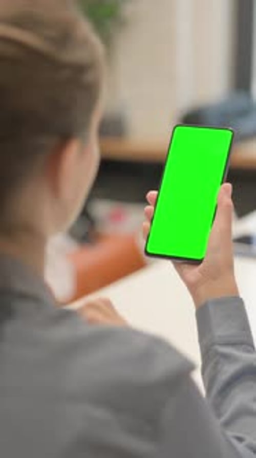 Business People Using Phone with Green Screen, vertical video