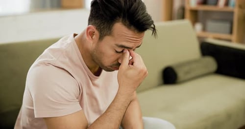 Stress, headache and depression with a man in therapy for mental health