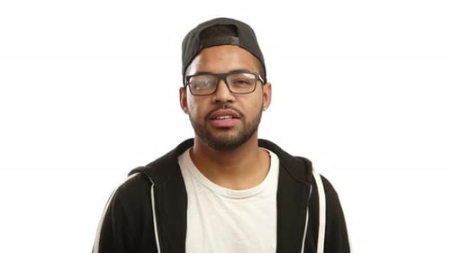 Young Adult Speaking Against White Background