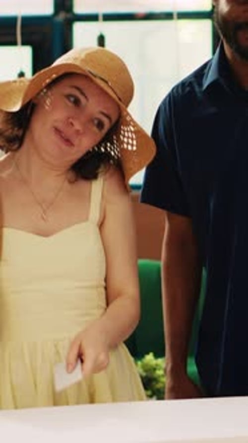 Vertical Video Couple Giving Access Room Card