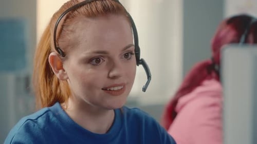 Woman Customer Service Agent Call Center Operator in Headset Talking to Online Customer Using