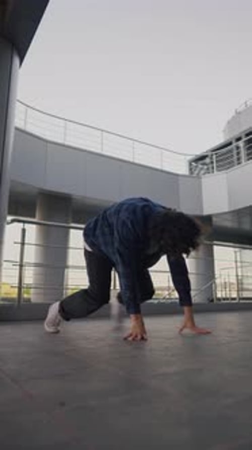 Vertical Video Stylish Male Street Dancer Dancing Hip Hop on Urban Background
