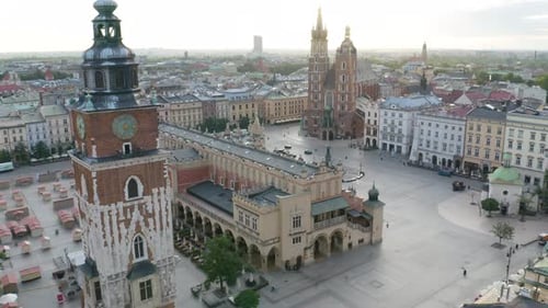 Cinematic Aerial Shot of Old Town Square in Krakow, Poland at Sunrise