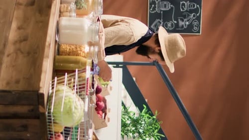 Man Selecting Fresh Produce at Market Stand