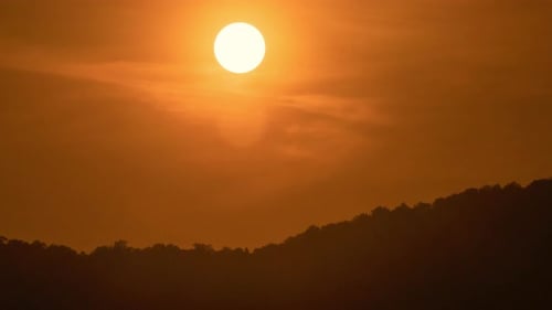 Orange Sunset Time-Lapse over Mountain Range