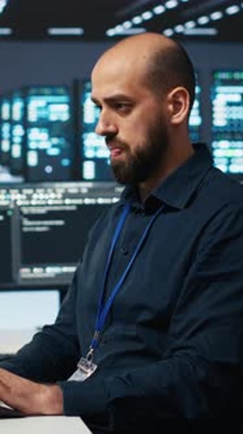 Vertical Video Engineer Coding Working in Data Center Facility Hosting Supercomputers