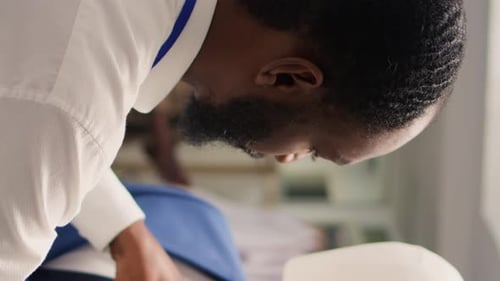 Vertical Video Man Arranges Mannequin in Fashion Shop