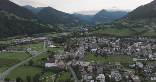 Aerial view of picturesque town in valley, Italy.