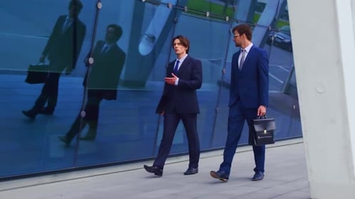 Confident Business Men Talking in Front of Modern Office Building Businessman and His Colleague