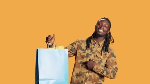 Happy Adult Buying Clothes on Sale at Mall Store