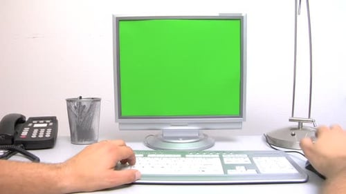 Working on Computer at Desk Blank