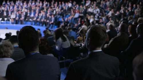 Large audience at corporate business conference, seminar