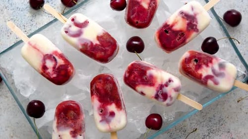 Delicious Cherry Popsicles on Bed of Ice