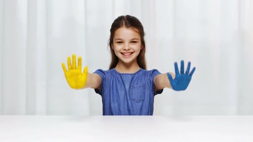 Education, School, Creativity, Art and Painting Concept - Smiling Little Student Girl