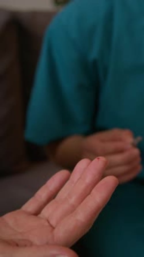 Blood Sample Being Taken From Finger