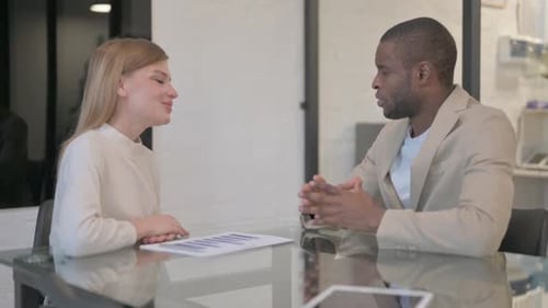 Business Meeting Concludes with Successful Handshake