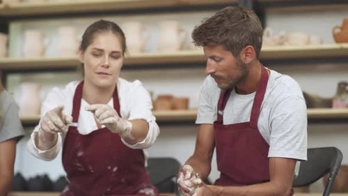 Pottery Workshop Pretty Woman Make a Workshop on Pottery Modeling for a Young Man Production of